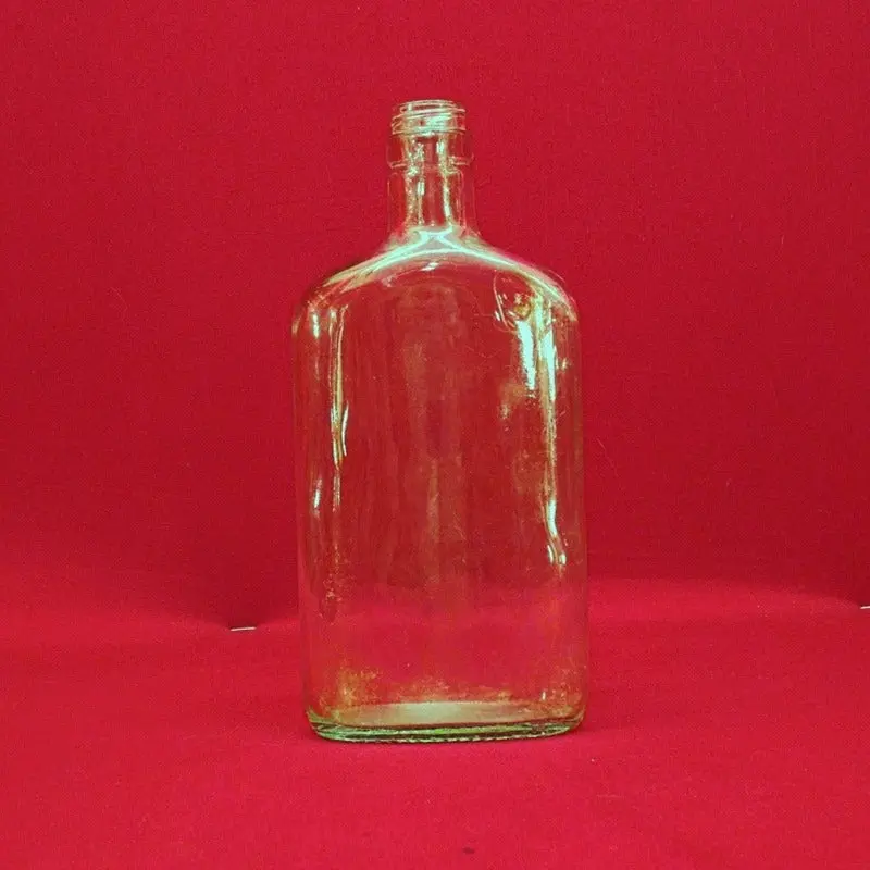 Vintage Elegance 1955 Glass Bottle 1
